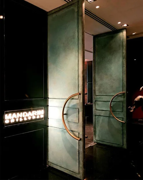 Brass verdigris hk door